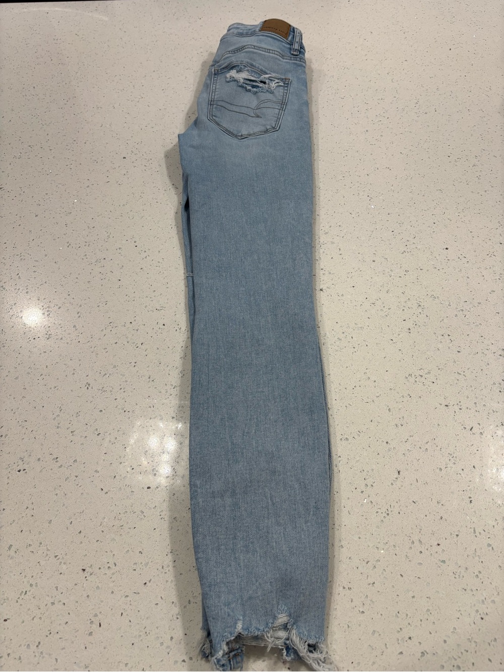 American Eagle Outfitters Light Blue Straight Leg Jeans with Distressed Hem